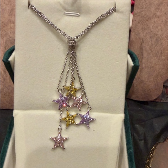 Elegant Silver and Gold Star Necklace - Picture 4 of 11